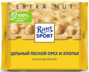 Шоколад белый Риттер цельный лесной орех и хлопья 100г Шоколад белый Риттер цельный лесной орех и хлопья 100г